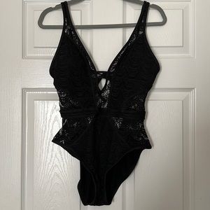 Becca’s black lace one piece size L